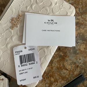 Coach white wristlet